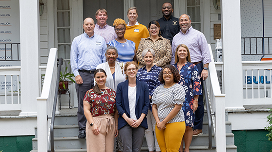 CEOE Advisory Council Members in a group photo on a set of steps outside a building.