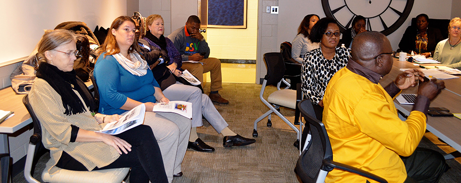 group of adults in a meeting