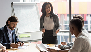 person giving a presentation during a conference meeting