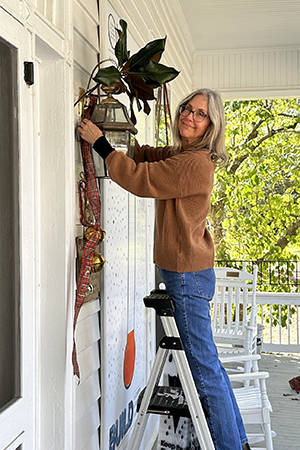 Jennifer added festive ribbons and bells to the front of Sunny Slope.