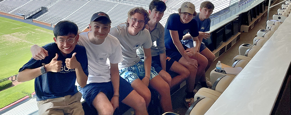 sStudents sit in the scholarship section of Jordan-Hare Stadium.
