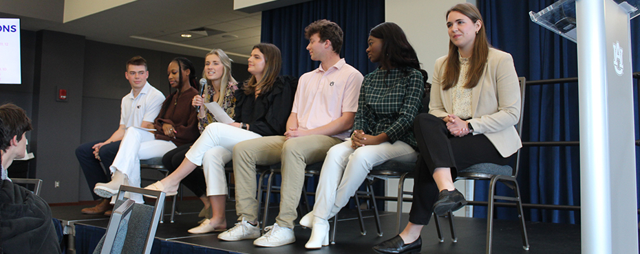 Panel of counselors speaking at conference.