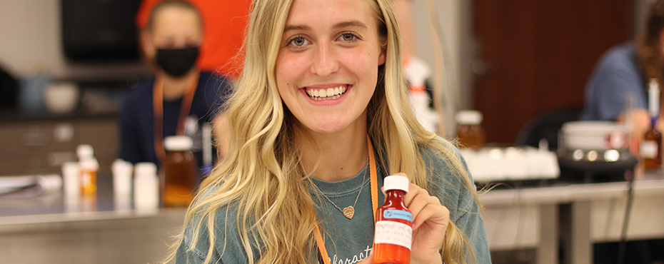 Student with liquid medicine