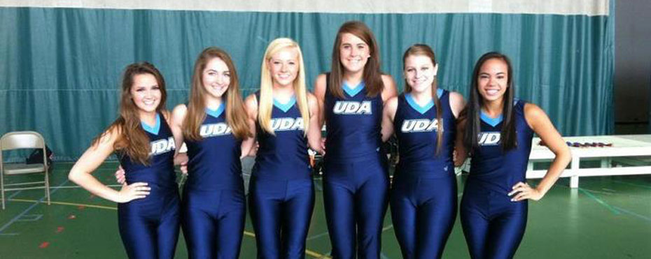 Six Universal Dance Association members pose for the camera.