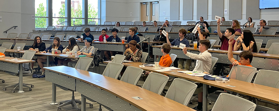Students raising placards to be recognized