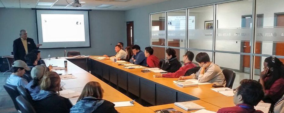 training participants listening to a presentation