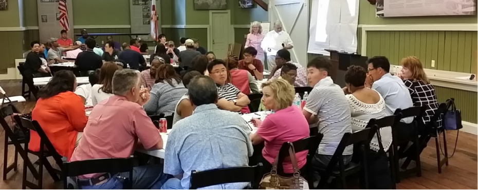 training participants listening to a presentation