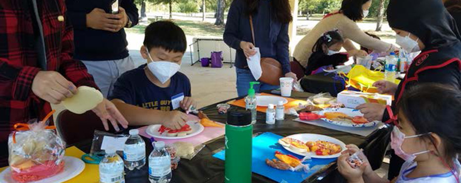 students decorating snacks